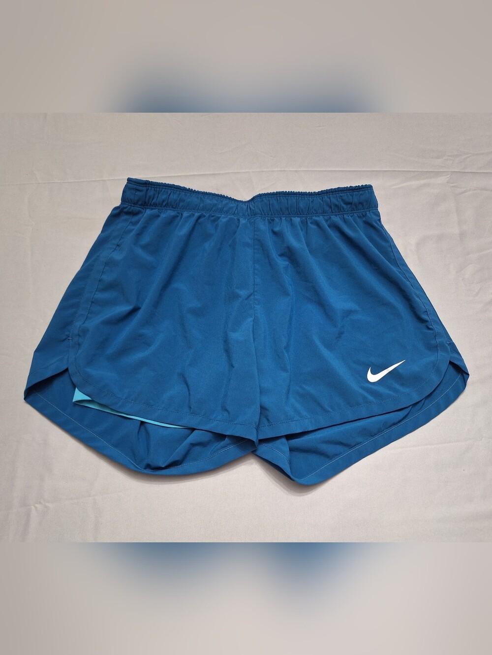Nike Blue Athletic Running Shorts with White Swoosh